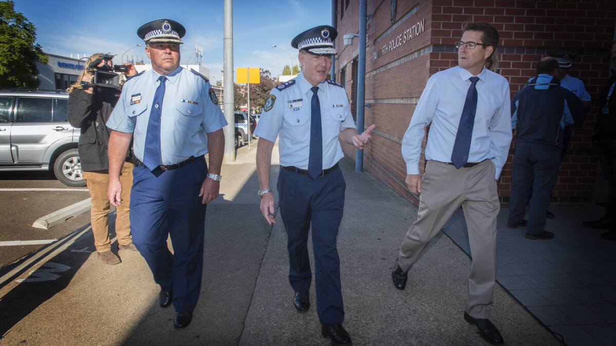 Taking the reins: NSW Police Commissioner Mick Fuller, middle, with new Deputy Police Commissioner for Regional NSW, Gary Worboys, pictured left, and Tamworth MP Kevin Anderson, right, in Tamworth on Friday. Photo: Peter Hardin
