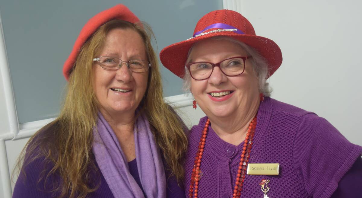 Roxanne Bancroft-Stuart and Stephanie Taylor are keen core members of Tenterfield's new Red Hat Society.