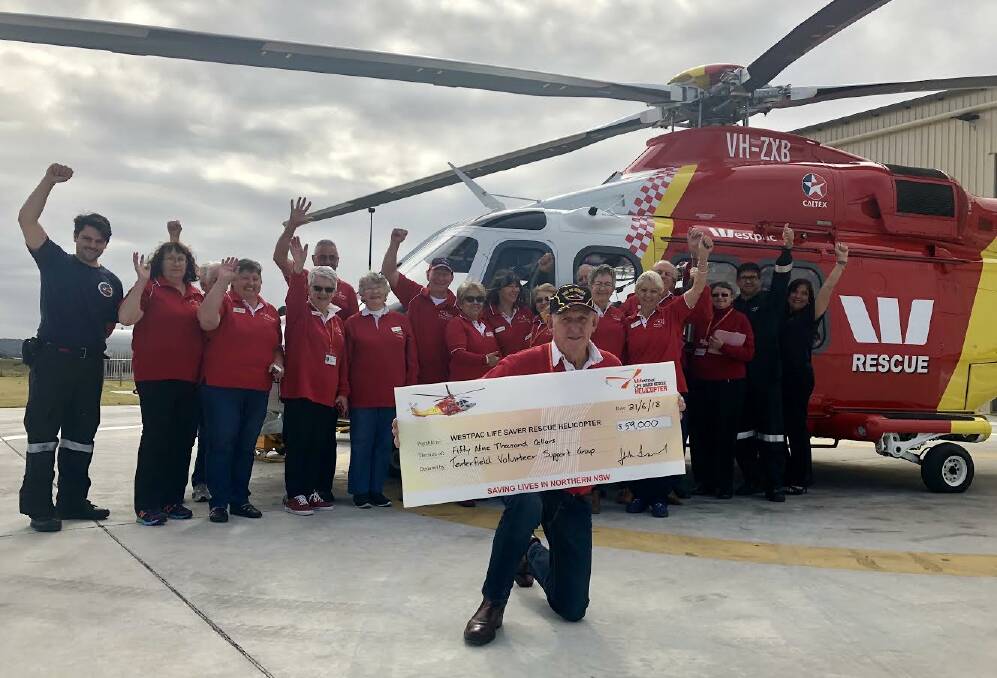 'Dodge' Landers and his Support Group crew met up with helibase crew to hand over Tenterfield's 2017/18 donation.
