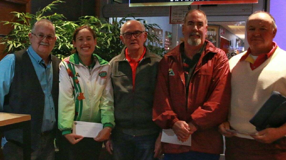 Elana Scott (flanked by Bowls Club president Ray Jordan and Sexton & Green's Graham Rossington) joined with teammates Dale Callaghan (Inglewood) and Terry Banditt (Tannymorel) to take second place.