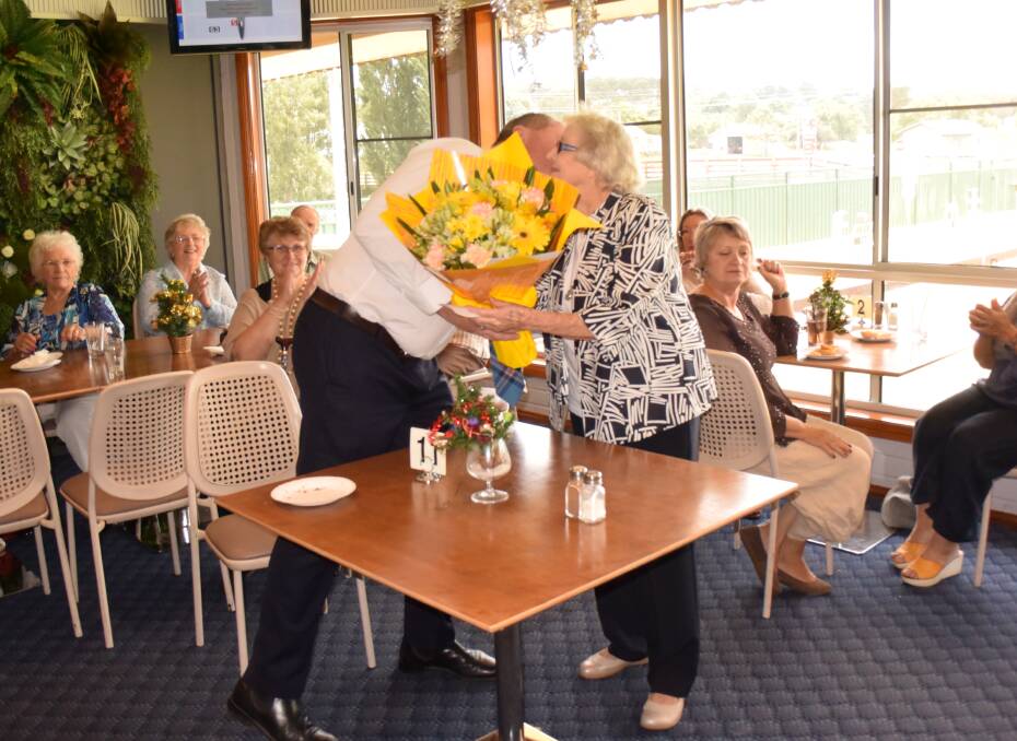 Deputy prime minister Barnaby Joyce thanks 'warhorse' Val Gardiner for her services to the National Party and last year's Christmas celebration.