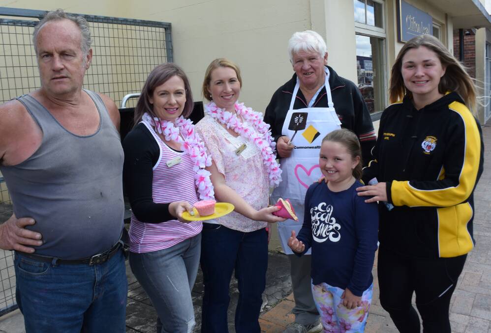 FOOD FOR THE SOUL: Steven Goddard, Karen Wells, Megan Watters, Stephen Wartnaby, Indie Murphy and Emma Anderson do their bit for breast cancer awareness.