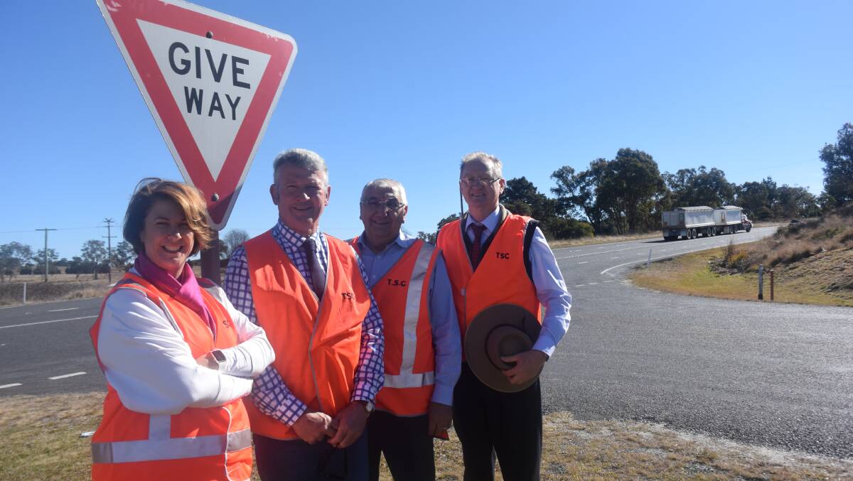 NSW Roads Minister Melinda Pavey, Tenterfield mayor Peter Petty, Lismore MP Thomas George and council’s chief operating officer Andre Kompler at the intersection to receive warning lights.