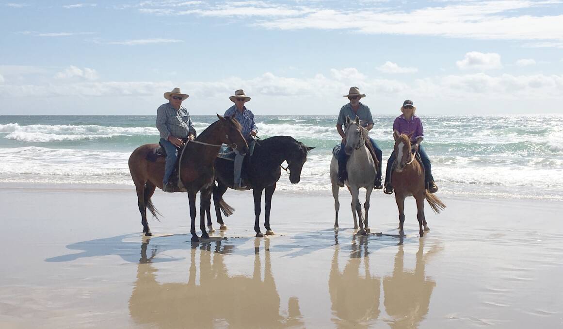 Bruce Petrie, Steve Alford, Philip Willcocks and Jennifer Koch on Cabarita Beach as part of the latest Border Country Trail Riders excursion.