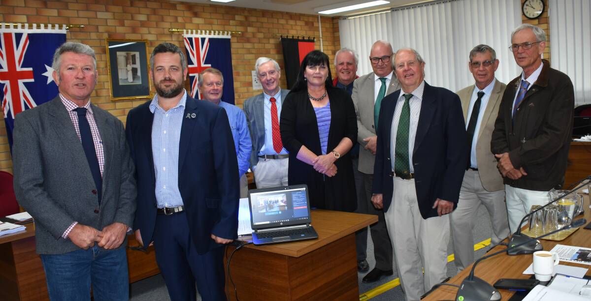 Tenterfield mayor Peter Petty, here with Snr Cst Chris Jordan, and fellow councillors Don Forbes, Brian Murray, Bronwyn Petrie, John Macnish, Greg Sauer, Tom Peters, Bob Rogan and Gary Verri voted unanimously to support the prisoner transport campaign.