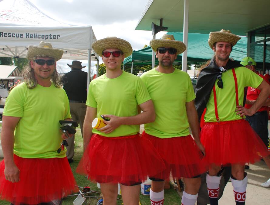 TUTUS OPTIONAL: It's all fun and games -- for a good cause -- at the Westpac Charity Golf Day.