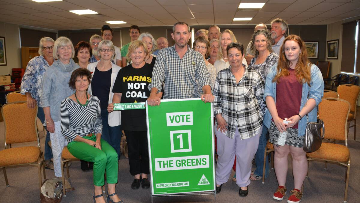 SEEING GREEN: Greens Party by-election candidate Peter Wills with supporters at the Tenterfield Bowling Club during a campaign tour. Photo by Melinda Campbell.
