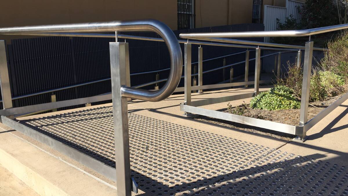 A new guard rail at the top of the steps is to protect against runaway wheelchairs and prams.