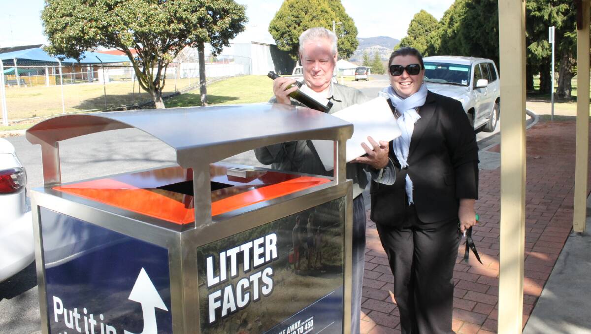 Denis Sherman, pictured here with council's chief corporate officer Kylie Smith, had the honour of being the first to use the new bins in Rotary Park.