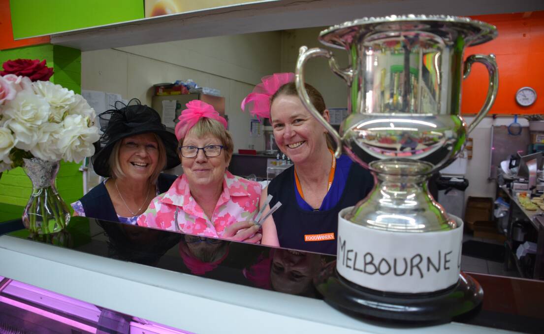 Marian Rogan, Jenny Condrick and Loretta Smith looked very glamourous behind the Foodworks deli counter on Tuesday.