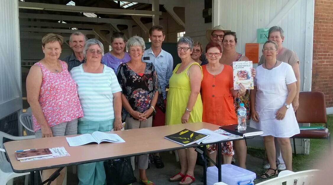Tenterfield Show stewards are busy preparing their sections for next month's show, with touch-ups and redecoration of display stands to showcase the community's entries.
