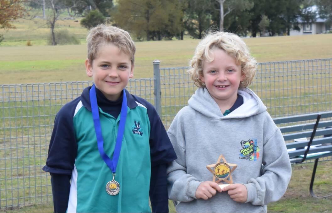 A clean sweep for GIPS with Howie Eastwood (on right) winning the junior boys and Sam Walsh as runner-up.