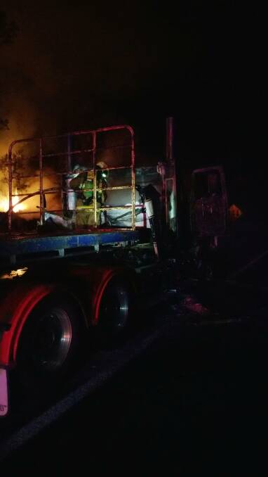 The Tenterfield Fire and Rescue crew worked on the truck fire while RFS firefighters tackled a grass fire ignited by the incident.