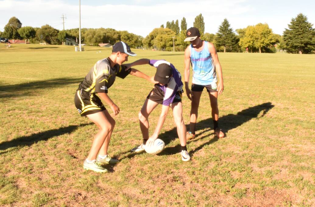 JJ Cusack, Kynan Koch and Tyler Sargeant get in some practice at training on Federation Oval.