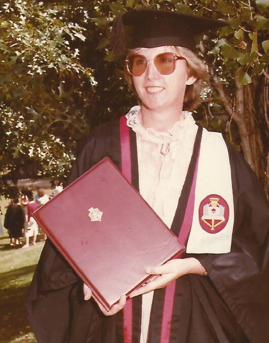 Margaret Zannes receiving one of three degrees. She passed away on April 21, after a long career helping others.