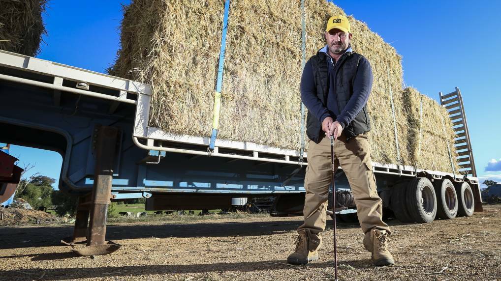 From driving trucks laden with hay to driving home a new golf shed project, Brendan Farrell keeps rollin' out help. Picture: James Wiltshire. 