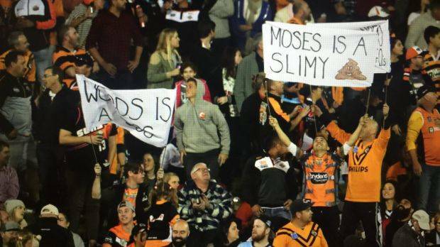 Not happy: Tigers fans showed their disapproval of departing stars Mitchell Moses and James Tedesco. Photo: NRL Imagery