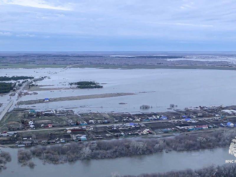 Floods have hit the regions of Kurgan, Tyumen and Orenburg after water levels rose in local rivers. (AP PHOTO)
