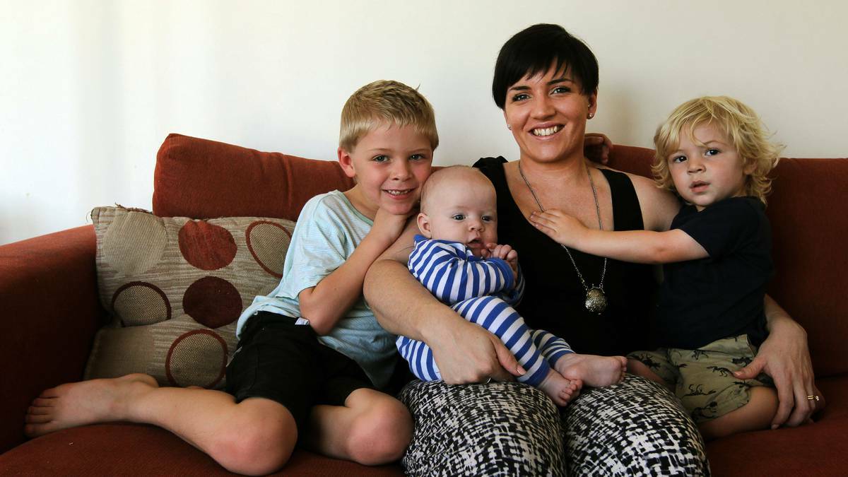 Jessie Bruton enjoys a cuddle with her boys Levi, 6; Klay, four months; and Nash, 2. Picture: SYLVIA LIBER
