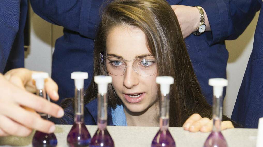 Taking part in the program, Sheridan was carefully checking the measurement in the experiment test tubes. Pict: PETER PICKERING, Ararat Advertiser