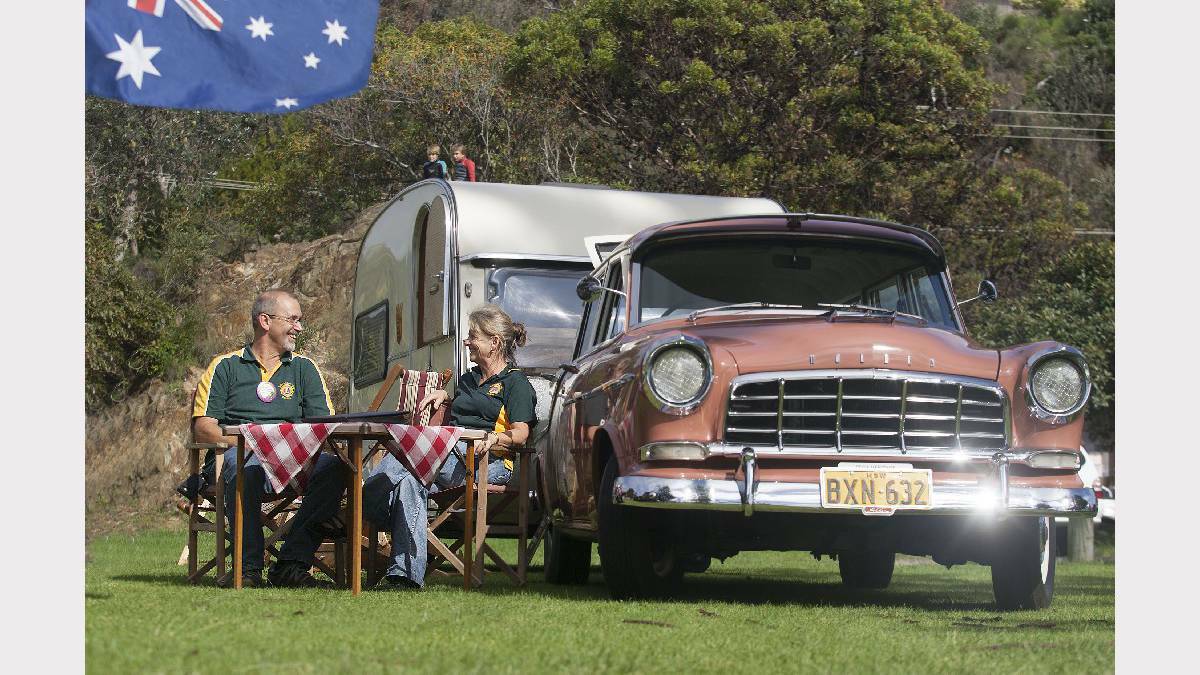 Bega Heritage Motor Club members Anthony and Kathy Dack show off their restored 1959 Holden SC Station Sedan and 1968 Tabbert Caravan. Pic: Bega District News