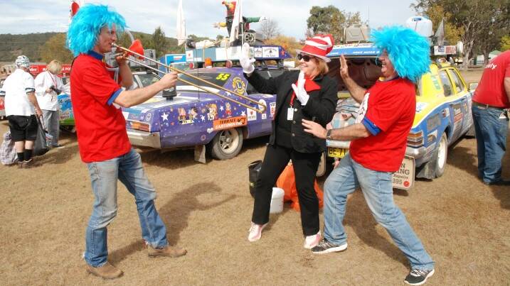 MAKING A DIFFERENCE ON THE ROAD: Steve Lavis and Robyn and Dennis Peters goof around during the Variety Bash stop in Tenterfield last week.