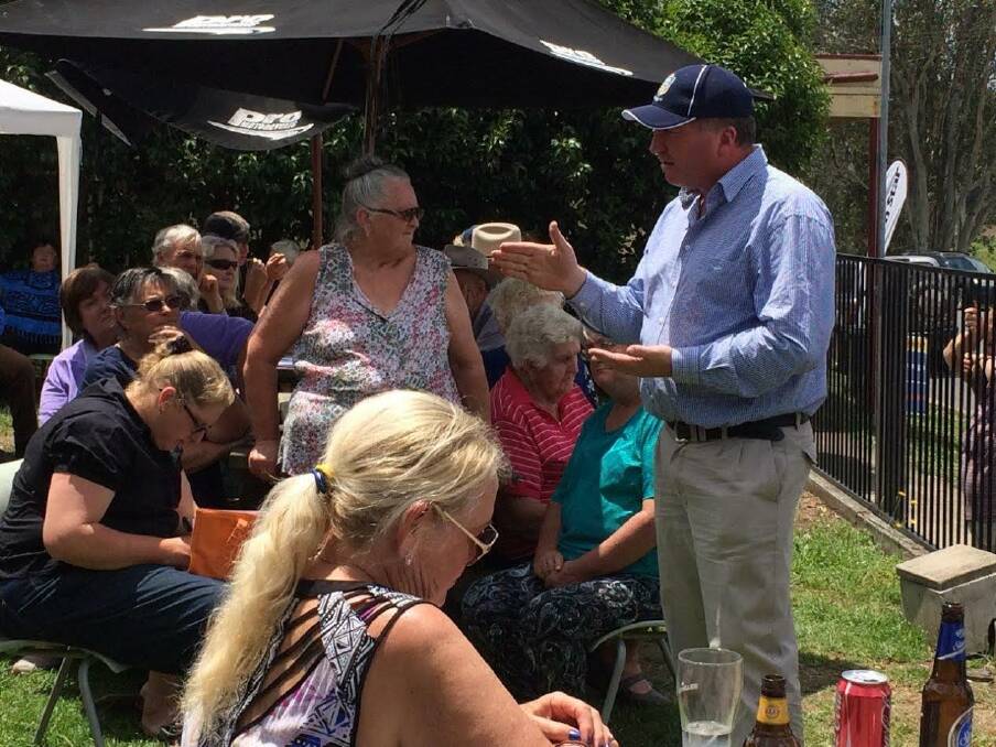 Barnaby Joyce speaks to some of his constituents during a stop at the Crown Hotel in Urbenville.