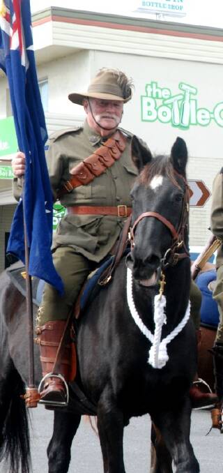 IN THE SADDLE: Jim Hamilton in Monday’s Anzac Day march down Manners Street.