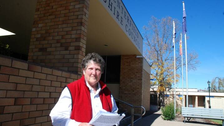 TAKING A STAND: Chrissie Fletcher arrives at council’s office with the petition.