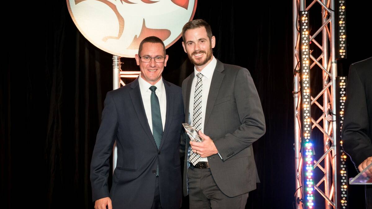 Outstanding: Sexton and Green sales manager Ben Silver received Holden’s 2015 Guild of Excellence from Peter Jamieson, Executive Director of Customer Experience with GM Holden.