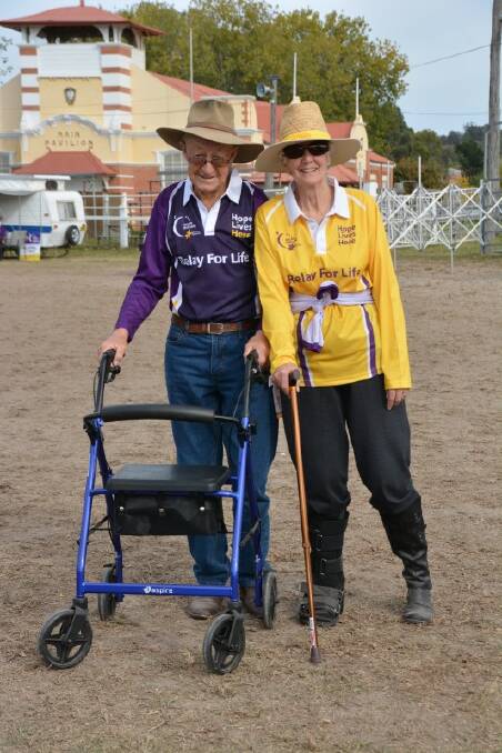 WALKING: Trevor Austin and Helen Taylor at the end of the relay.