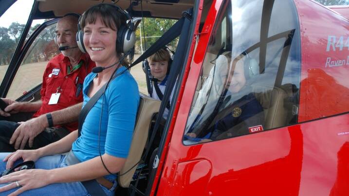 CHOPPER FLIGHT: Mum Cara and Lila and Sonny Newton got a birds-eye view of town last week, thanks to the generosity of helicopter owner Peter Day.
