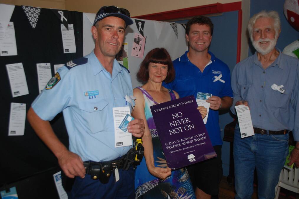 OATH AGAINST VIOLENCE: Tenterfield police sergeant Michael Eaton, Gail Galloway from the Hub, Jason Ash and Noel Cossins all took the oath to stamp out domestic violence.