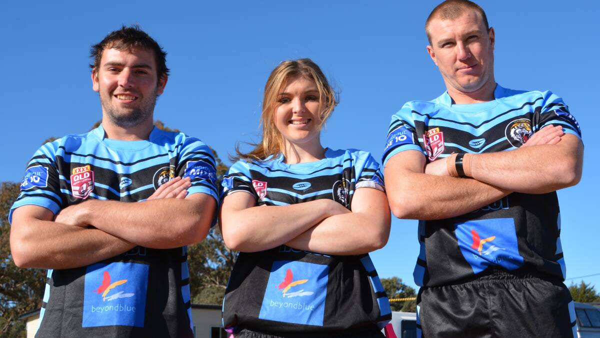Jake Kelly, Mariah Mooney and Brendan Minns show off the weekend's once-off jerseys. 