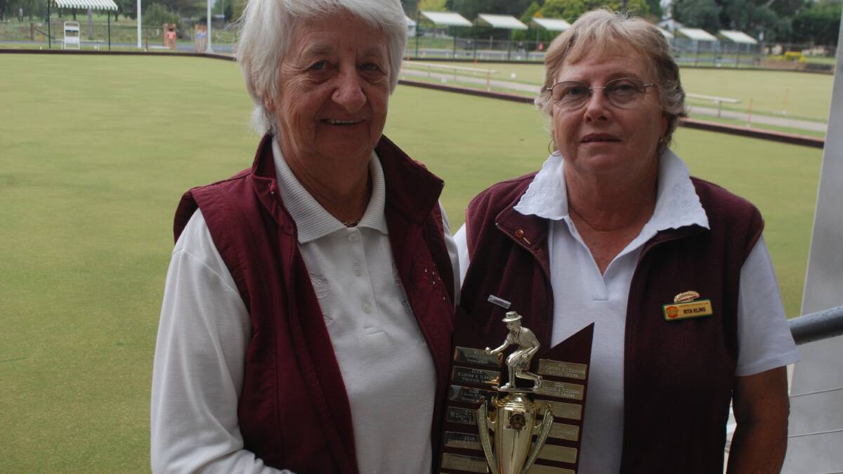 Penny Stanbridge and Rita Kling hold aloft their district trophy which they won last week. 