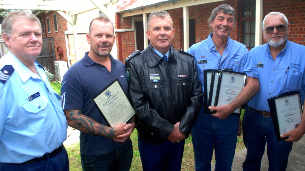 Tenterfield Sergeant Greg Fitzpatrick, Senior Constable Rob Darkin, Superintendent Fred Trench and police volunteers Peter Robinson and Dan Roex. 