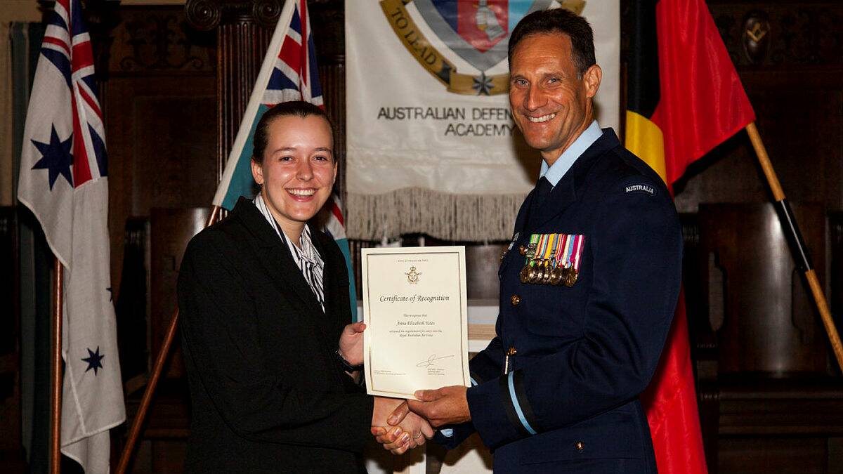 RECRUIT: Anna Yates receives her Certificate of Recognition from Air Commodore Scott Winchester at the ADFA Appointment Ceremony held in Brisbane last week.