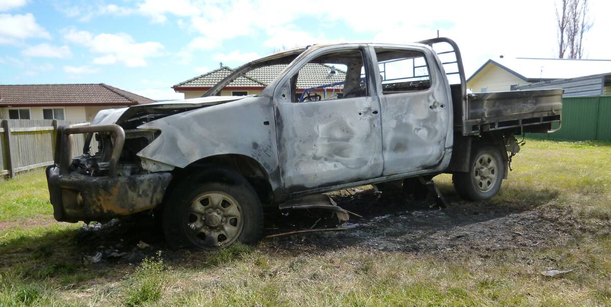 The stolen vehicle was torched and left outside a residence on Naas Street. Photo courtesy of Peter van Schaik.