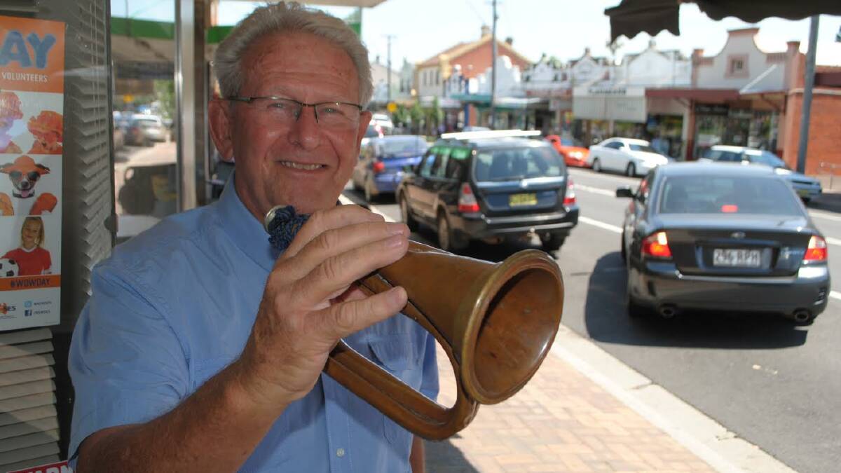 Terry Kneipp shows off the bugle that has been passed down through the family since the first World War.