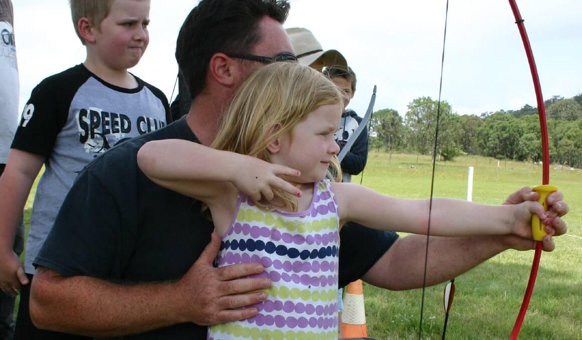 KEEN ARCHERS: Rayfe, Lance and Bria Van Zyl joined in the archery day on Sunday.