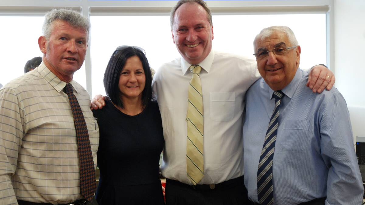 HIGH COST: Minister Barnaby Joyce with wife Natalie, Tenterfield mayor Peter Petty and Lismore MP Thomas George at his Tenterfield office Christmas party. Mr Joyce has come under fire for the costs expended on the Tenterfield and Armidale offices.