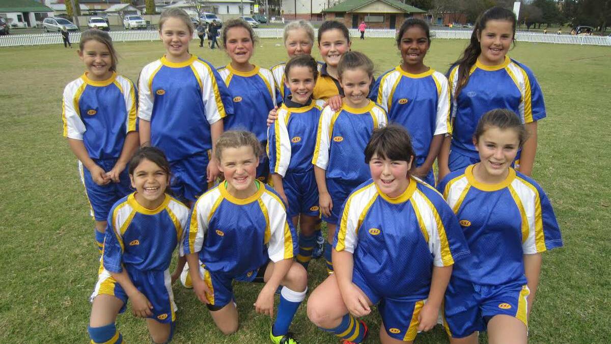 Phoebe Cooper (pictured front row far right with the Sir Henry Parkes girls team) stared in a recent state carnival.