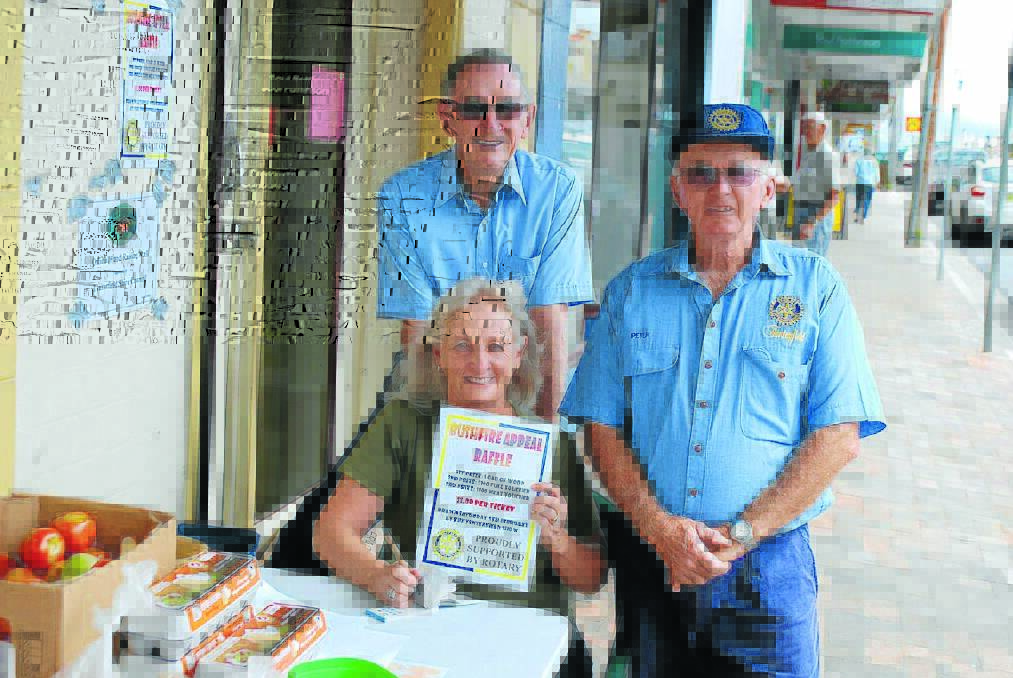 Raising funds: Christine Foster, Geoff Sullivan and Peter Chittick from Rotary at Friday’s street stall.