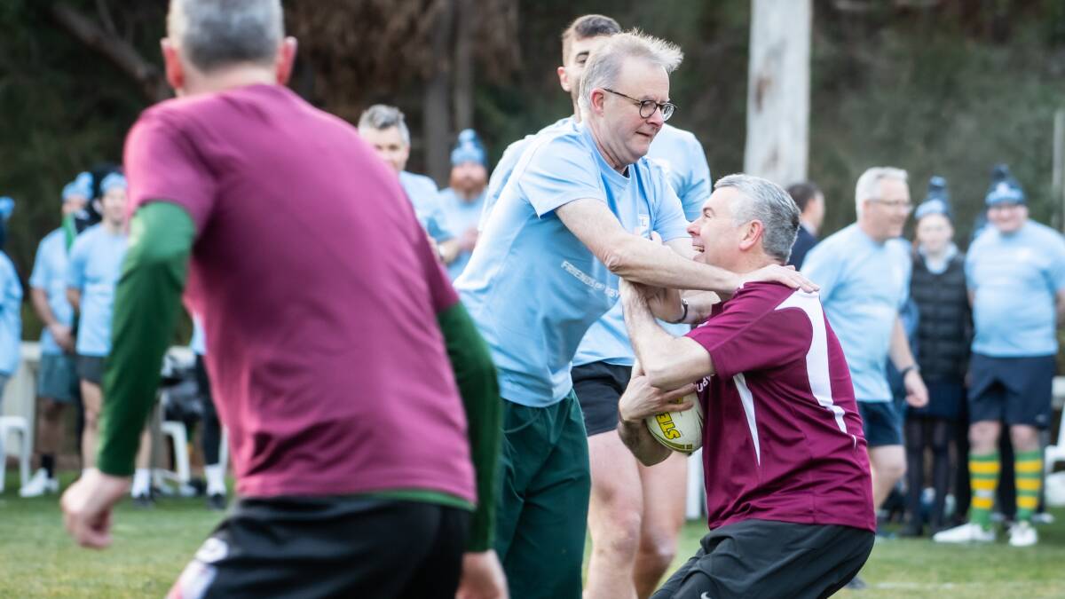 Parliamentarians battle it out in a touch football match. Pictures: Karleen Minney