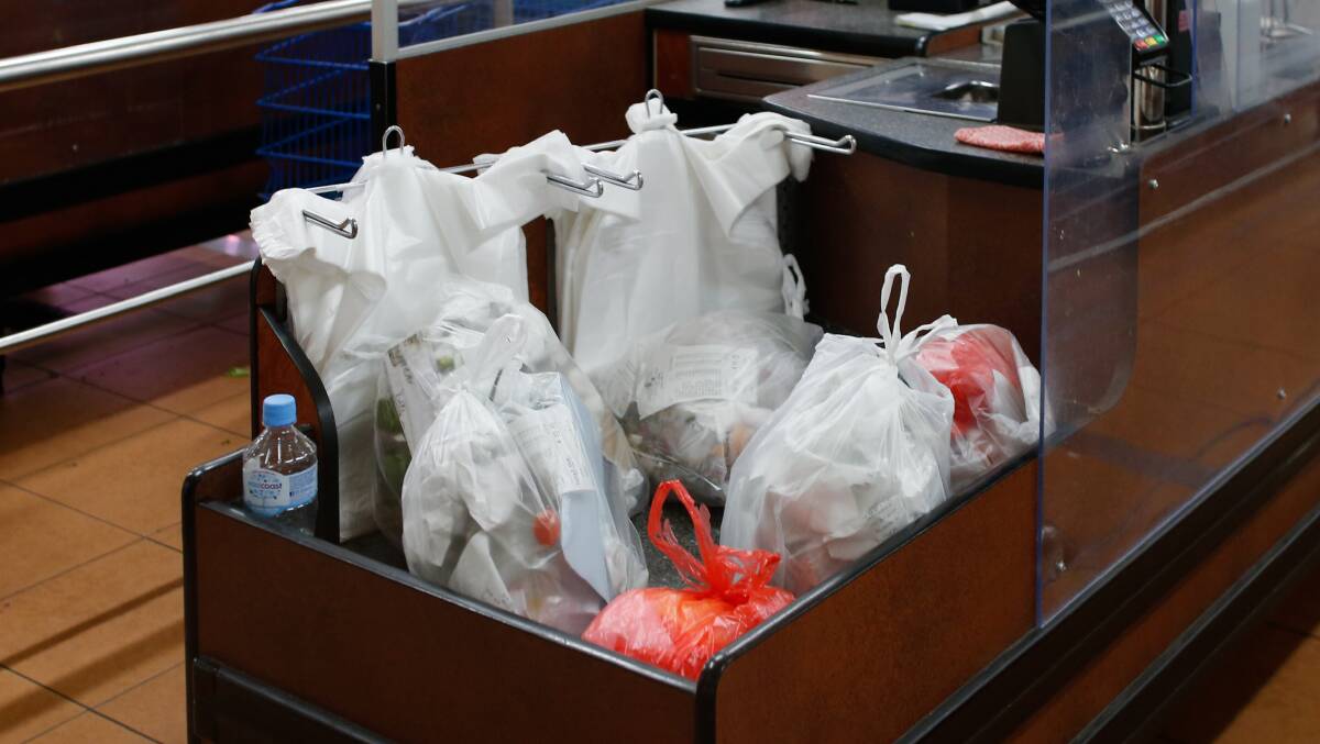 Single-use plastic bags are banned across NSW from June 1, 2022 when customers will be encouraged to bring along their own shopping bags. Picture: Illawarra Mercury