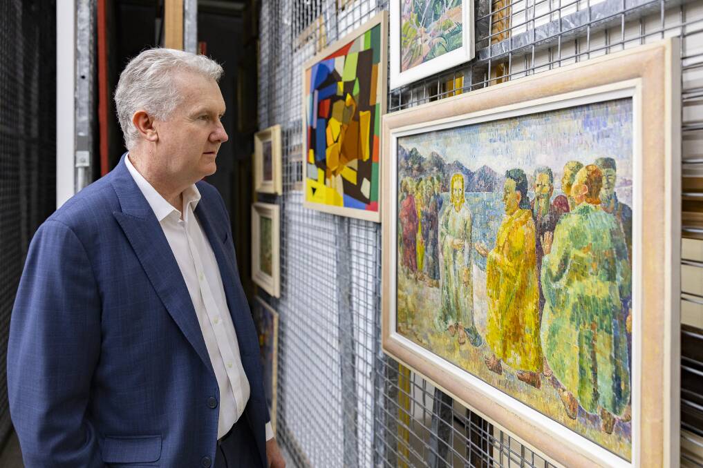 Federal Minister for the Arts Tony Burke admires one of Grace Cossington-Smith's works, currently in storage at the National Gallery. Picture supplied
