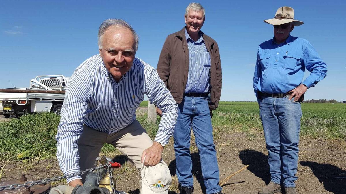 Field inspection: Richard Bull inspects a TSR water point with North West LLS Chair Conrad Bolton and board member Geoff Cruickshank. Photo: Supplied.