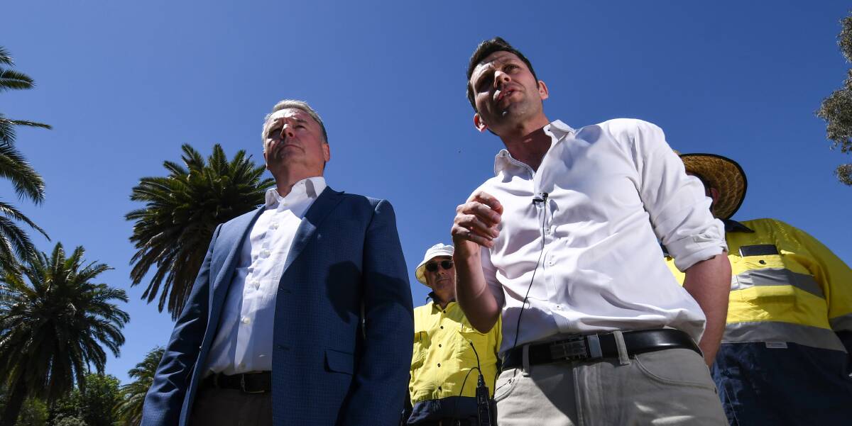 ROUND TWO: Shadow Agriculture Minister Joel Fitzgibbon flanks Labor's candidate David Ewings in Tamworth. Photo: Gareth Gardner