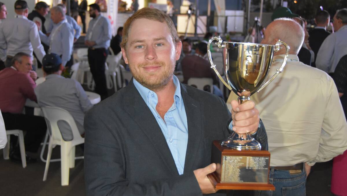 LEADER: Young Lot Feeder of the Year Ben Emery, from Rangers Valley in Northern NSW, receives his award at the Australian Community Media dinner held as part of the Smart Beef 2019 conference in Dalby tonight.