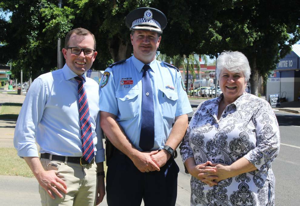 Taking charge: Superintendent Scott Tanner, pictured centre, with Northern Tablelands MP Adam Marshall, left, and Moree Plains Mayor Katrina Humphries, will oversee 22 police stations in the New England Police District. Photo: Sophie Harris